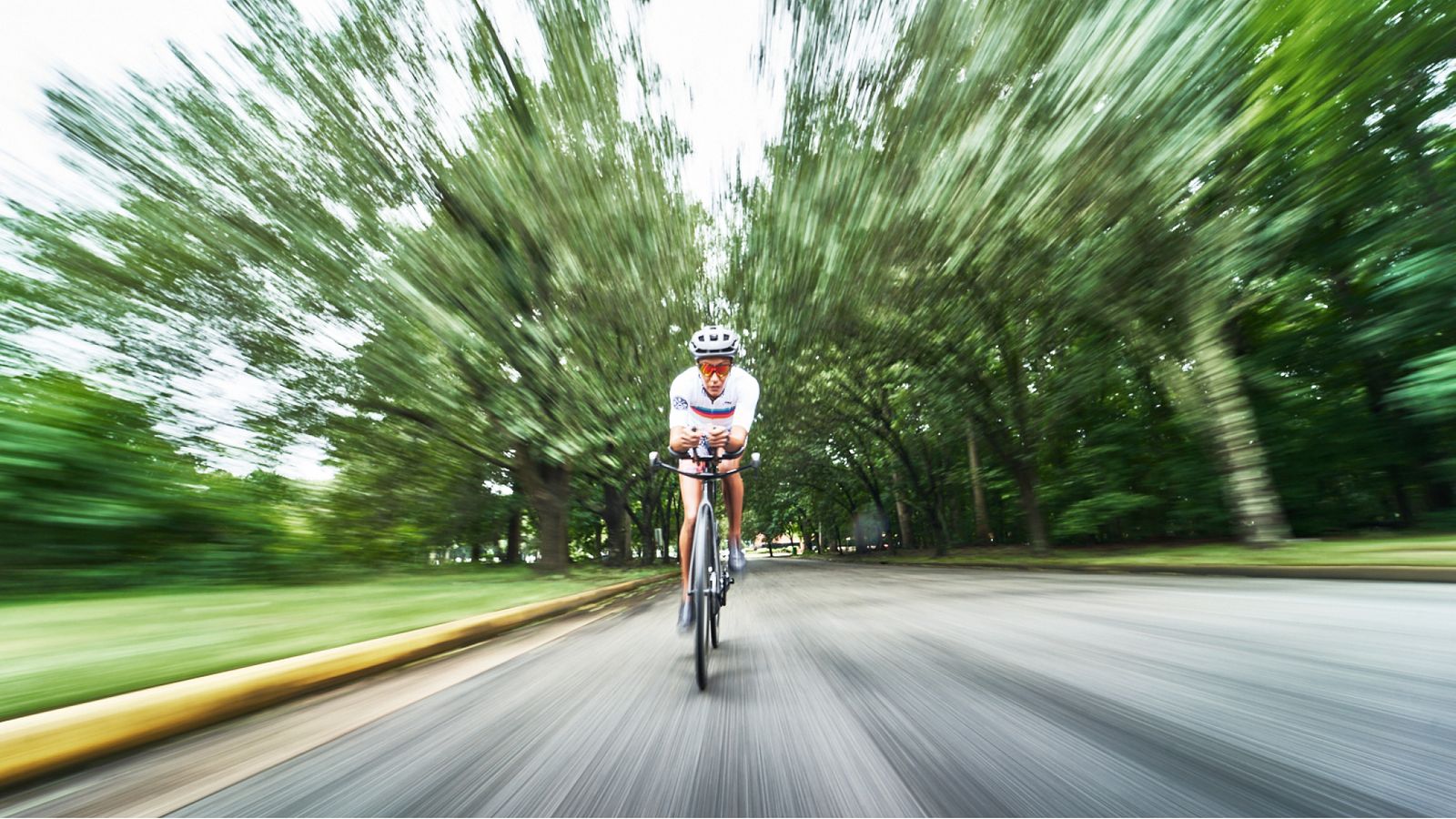 Triathlete Sika Henry Riding Bike for Cervelo Cycles
